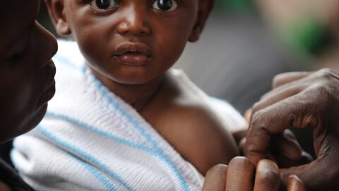 Child being vaccinated against measles