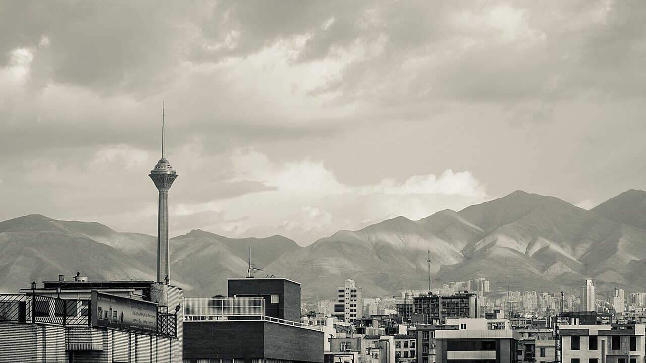 The Tehran skyline with Milad Tower and the Alborz mountains